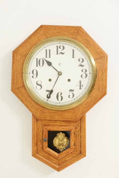 This Waterbury clock is in working order and includes the key. The 